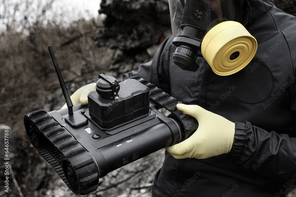 Scientist dosimetrist (radiation supervisor) in protective clothing and