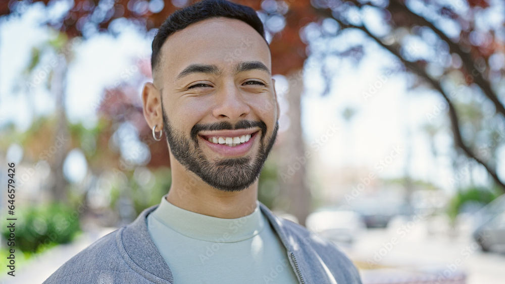 Young hispanic man smiling confident at park Young hispanic man smiling confident at park