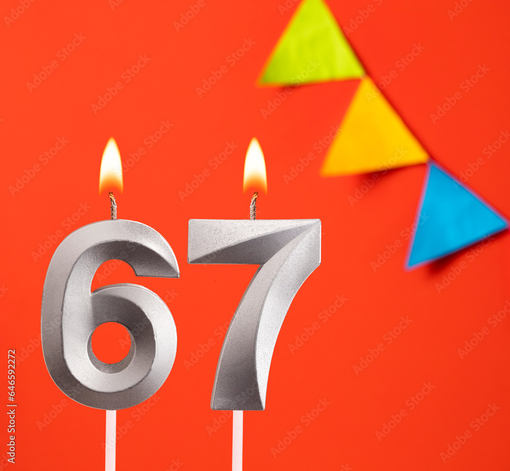Birthday card - Number 67 candle in orange background Birthday card - Number 67 candle in orange background