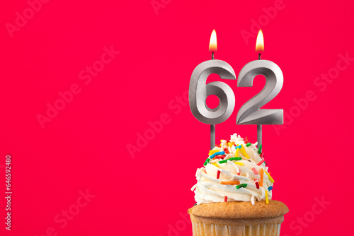Horizontal birthday card with cake - Burning candle number 62