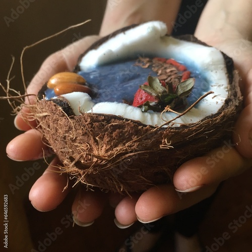 coconut ice cream with strawberries and hazelnuts