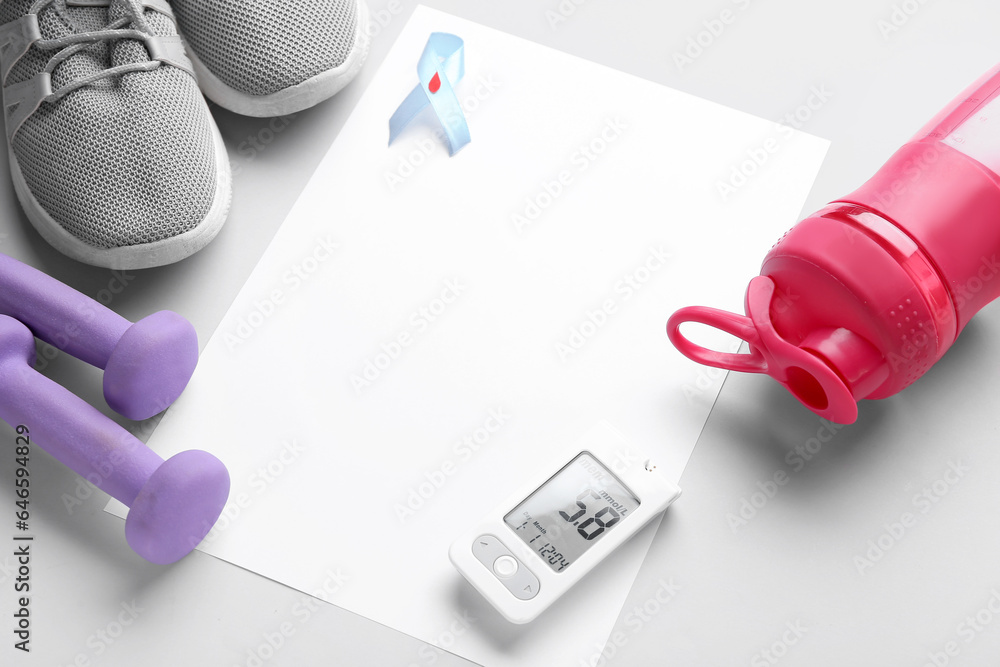 Blank paper with glucometer, awareness ribbon and sports equipment on light background. Diabetes concept