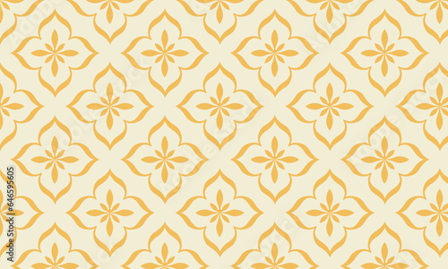 Indonesian batik design with geometric pattern of gold floral ornaments on yellow background. abstract floral seamless pattern vector illustration