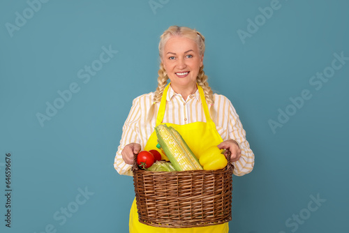 Mature female farmer with w...