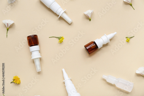 Nasal drops with flowers on beige background