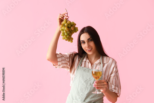 Young woman with glass of w...