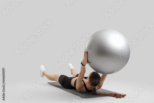 Sporty young woman training...