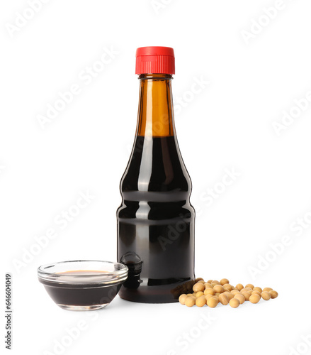 Natural soy sauce and soybeans isolated on white