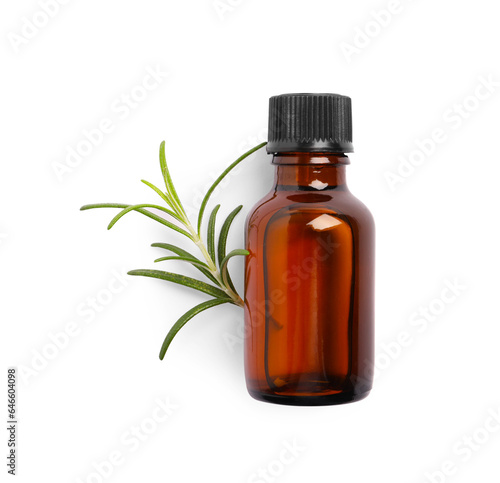 Sprig of fresh rosemary and essential oil on white background, top view