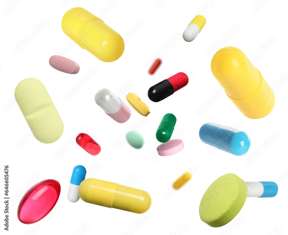 Many different colorful pills falling on white background Many different colorful pills falling on white background