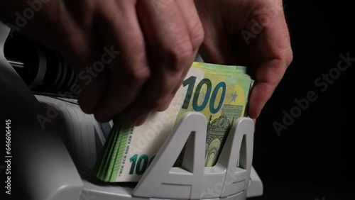 Cash Counting Machine counting 100 euro banknotes