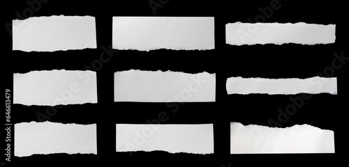 ripped white paper on a black isolated background