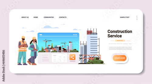 woman man architects or engineers in uniform standing near unfinished building construction site background