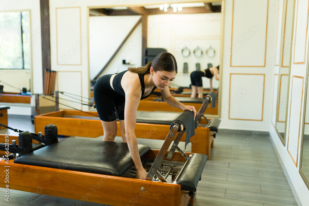 Beautiful woman practicing her core stability Beautiful woman practicing her core stability
