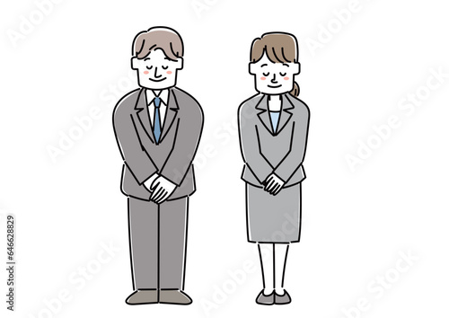 お辞儀をする会社員の男女