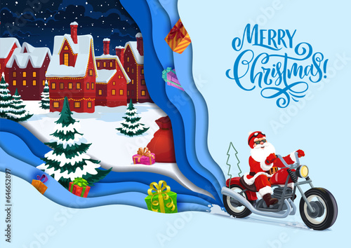 Christmas paper cut santa on bike and winter town with gifts on snow. Vector greeting card or banner with funny Father Noel biker hurry to kids at night countryside. 3d layered effect papercut design