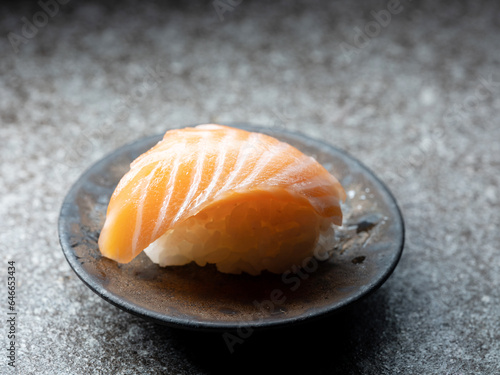 Sliced salmon sushi on a plate 