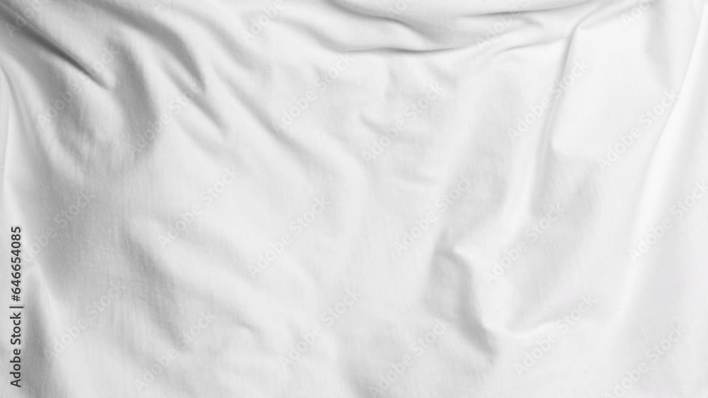 White fabric blowing in slow motion White fabric blowing in slow motion