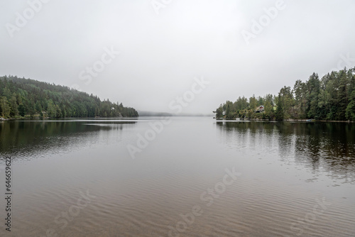 Lake Ragnerudssjoen in Dalsland Sweden beautiful nature forest pinetree swedish houses © CL-Medien