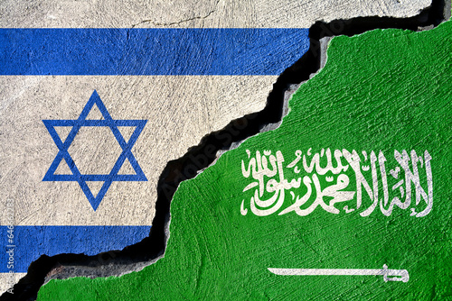 Concept saudi arabia and Israel flag on cracked background  photo
