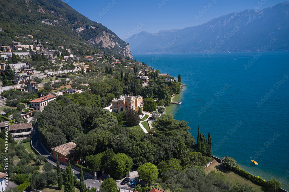 Panoramic aerial view of the city of Gargnano located on Lake Garda Italy. Coastline of the resort town of Gargnano Lake Garda Italy. The city is located on the shores of Lake Garda.