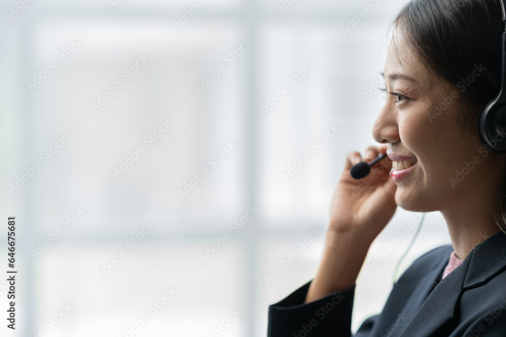 Asia call center with headset and microphone working on laptop Female entrepreneurs serving customers, business information, inquiries Support call center representatives help customers. Asia call center with headset and microphone working on laptop Female entrepreneurs serving customers, business information, inquiries Support call center representatives help customers.