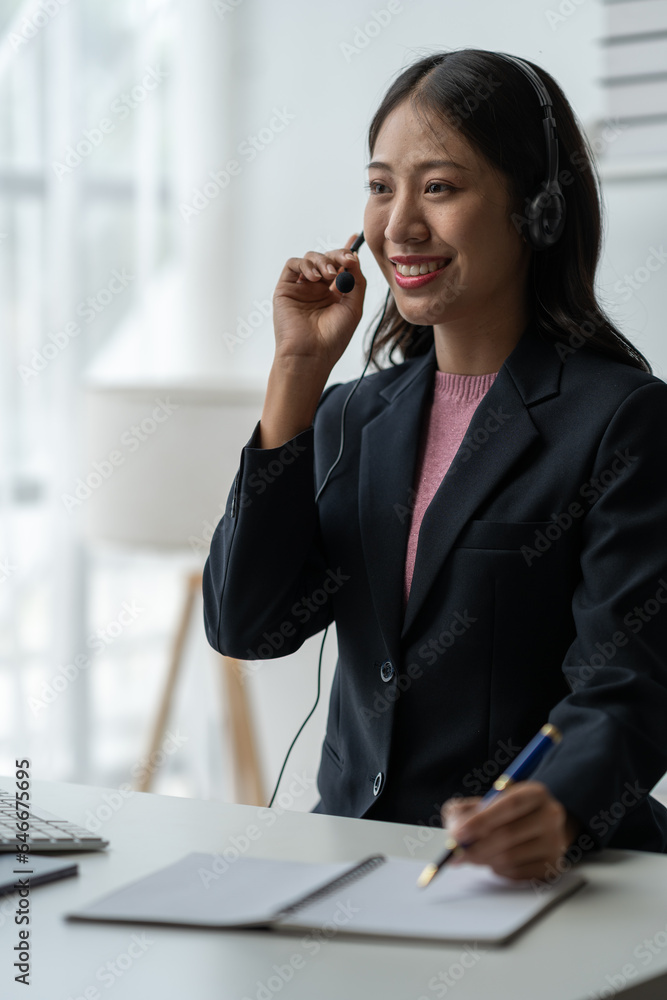 Asia call center with headset and microphone working on laptop Female entrepreneurs serving customers, business information, inquiries Support call center representatives help customers. Asia call center with headset and microphone working on laptop Female entrepreneurs serving customers, business information, inquiries Support call center representatives help customers.