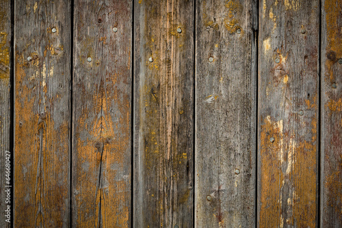 wooden background with weathered wood and ruusty nails
