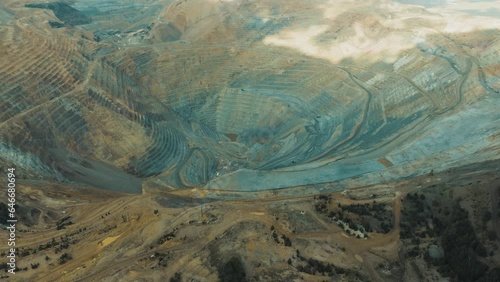 Bingham Copper Mine in Utah - aerial pull back to reveal the Salt Lake valley photo