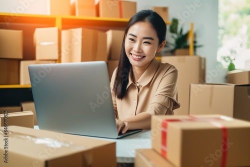 Young business woman working online shopping at her home
