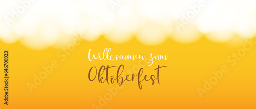 Oktoberfest. Beer festival. Horizontal yellow banner with beer foam and the inscription German Willcommen zum Oktoberfest.