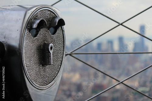 coin operated binocular, A telescope looking with Manhattan in the background