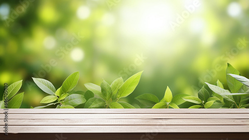 Wooden garden table  green leaves  spring or summer background