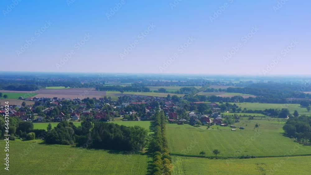 Aerial view of a typical village in the North German lowlands between fields and meadows Aerial view of a typical village in the North German lowlands between fields and meadows