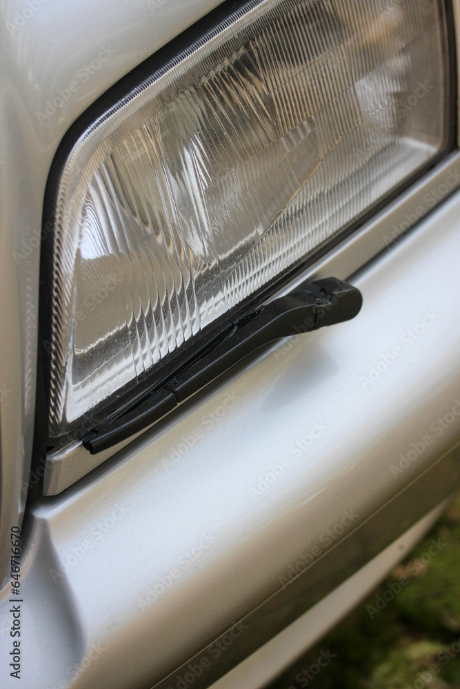 Modern classic car headlight detail
