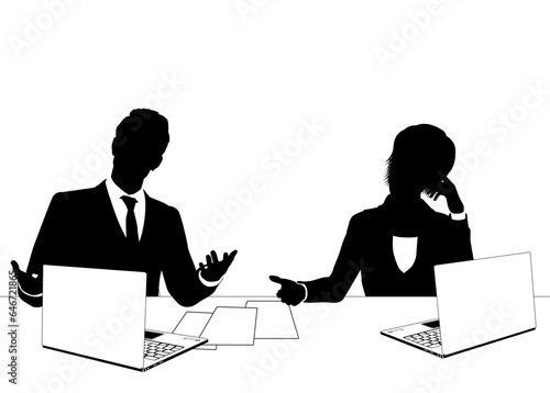 News anchor presenters or business people seated at a desk with laptops in silhouette