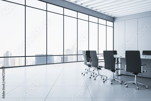 Contemporary meeting room interior with concrete flooring and panoramic window with city view and daylight. Commercial office concept. 3D Rendering. photo