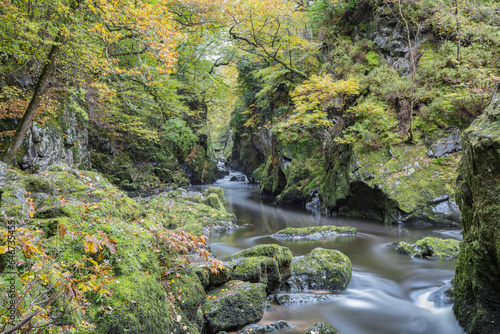 Autumn at Fairy Glen waterfall in Snowdonia National Park, Betws-y-Coed, Wales.