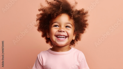 Joyful kid wearing neutral clothes on a beige studio background. Generative AI
