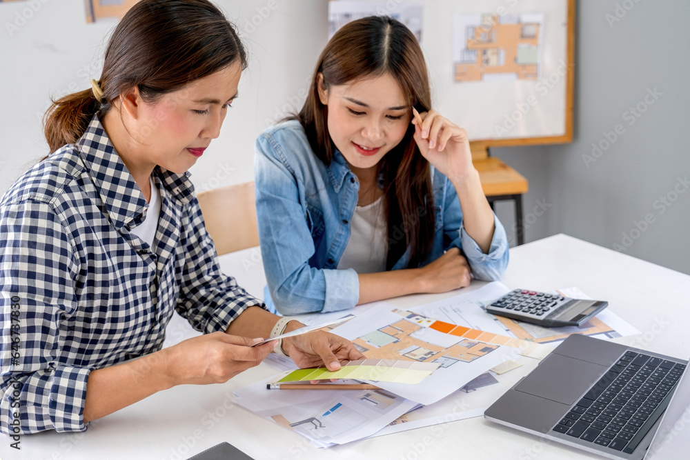 Architect design works drawing sketches, plans, blueprints and building architectural construction models in an architect studio. Architect design works drawing sketches, plans, blueprints and building architectural construction models in an architect studio.