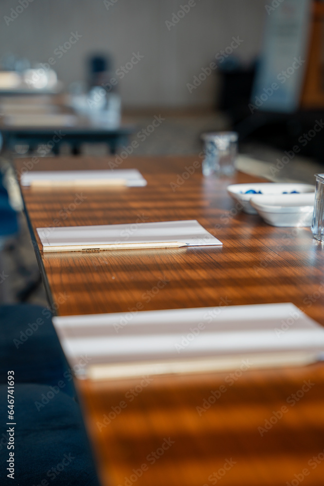 Obraz premium notebook and pen at table for education