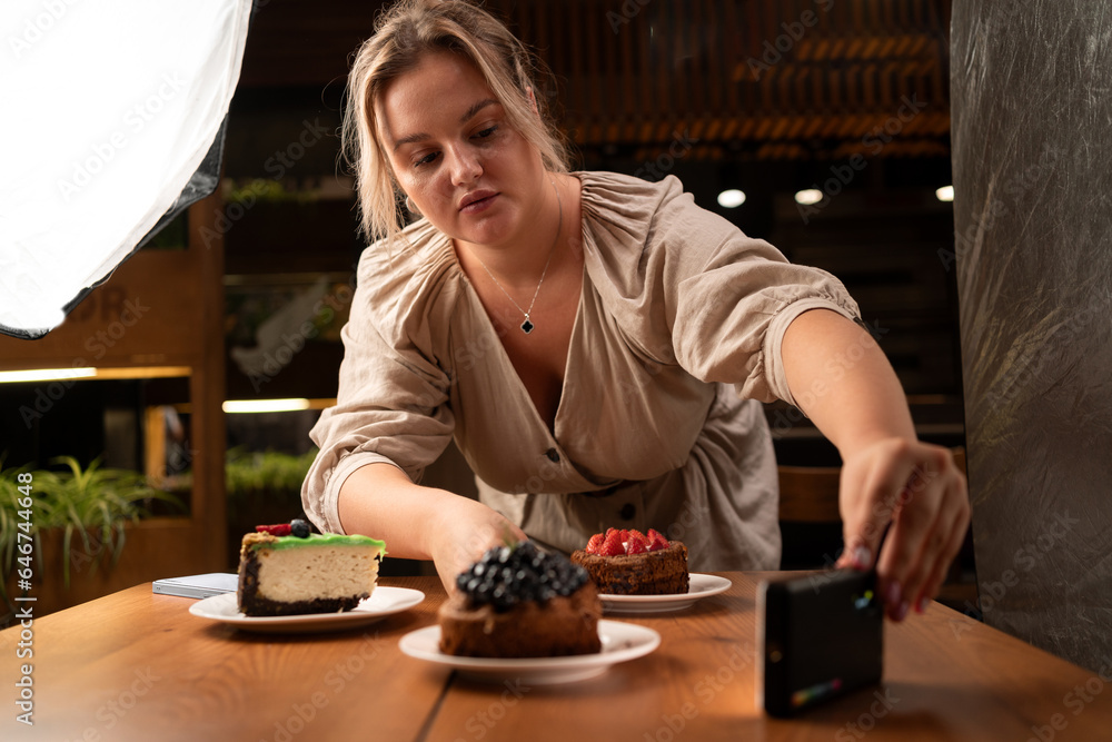 Shooting content for a cafe, photographer working with artificial light. Shooting content for a cafe, photographer working with artificial light.
