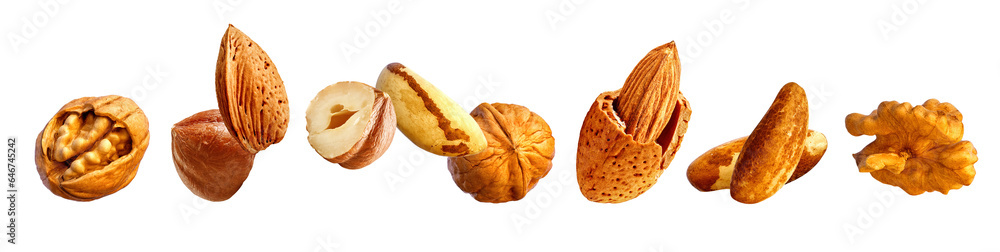 Assorted nuts isolated white background. Healthy diet vegetarian, vegan food design elements. Natural raw food high in protein, fat, fiber - brazil nuts, hazelnuts, almonds, walnuts. Studio macro shot Assorted nuts isolated white background. Healthy diet vegetarian, vegan food design elements. Natural raw food high in protein, fat, fiber - brazil nuts, hazelnuts, almonds, walnuts. Studio macro shot