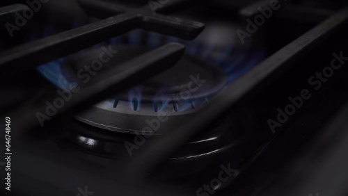 Turning on the stove in slow motion 120fps to 24fps photo