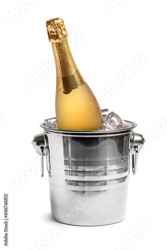 A bottle of champagne in a bucket of ice. Isolate on white background