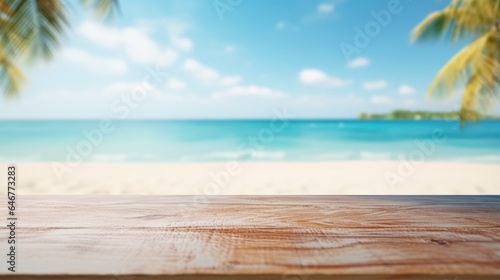 Mock up with empty wooden desk on blurred tropical background with sand or ocean and palm trees. Background for product presentation or showcase