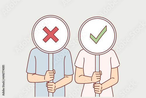 People with yes and no signs in hands, demonstrating opposite opinion when voting or referendum