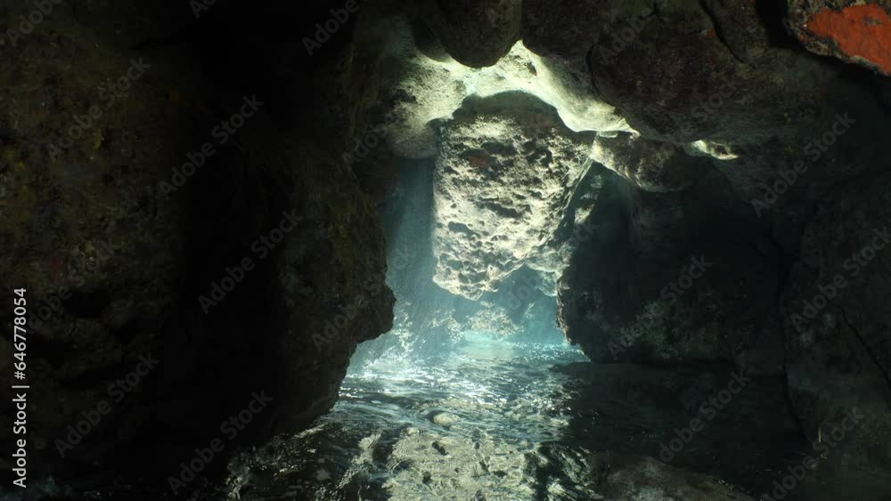 sun ray and sun beam scenery underwater cave divig with some fish sun ray and sun beam scenery underwater cave divig with some fish