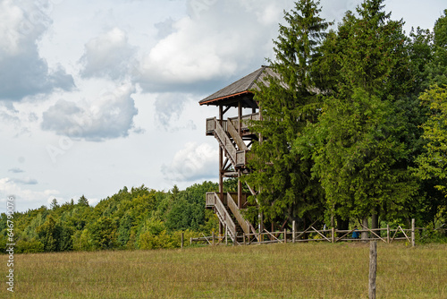 landscape with wooden observation tower at the Dylewska Gora hill near Wysoka Wies in Poland photo