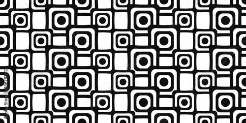Black and white rings squares. Seamless abstract interior pattern. A stylish pattern of square rings connected in a chain or mesh.